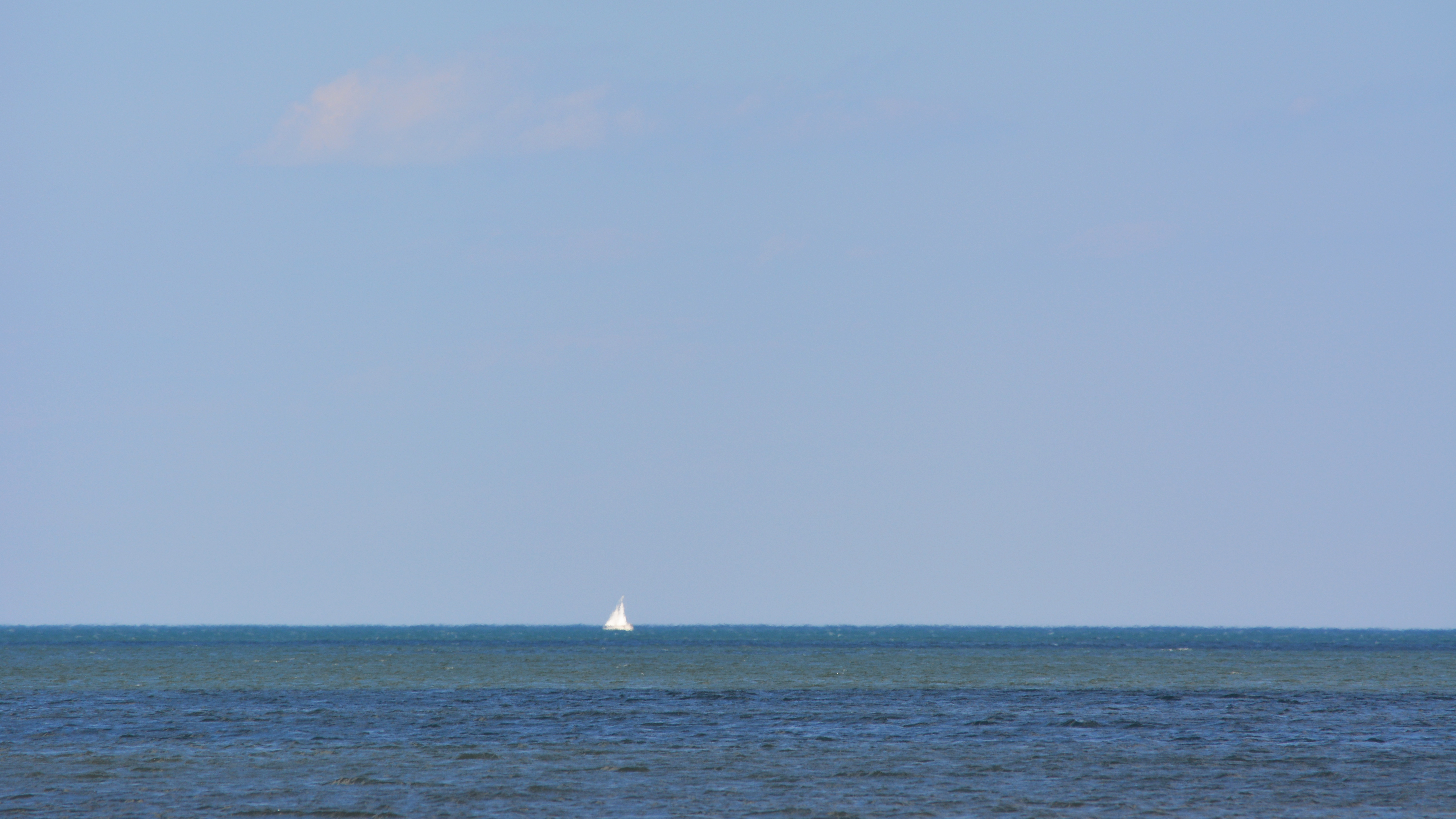 A sailboat in the distance