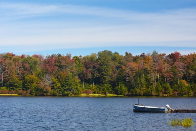 A boat sits in the lake at Ricketts Glen State Park